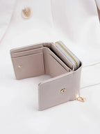 Billetera pequeña con botón a presión