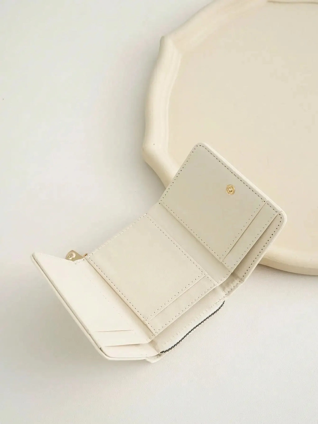 Billetera pequeña con botón a presión